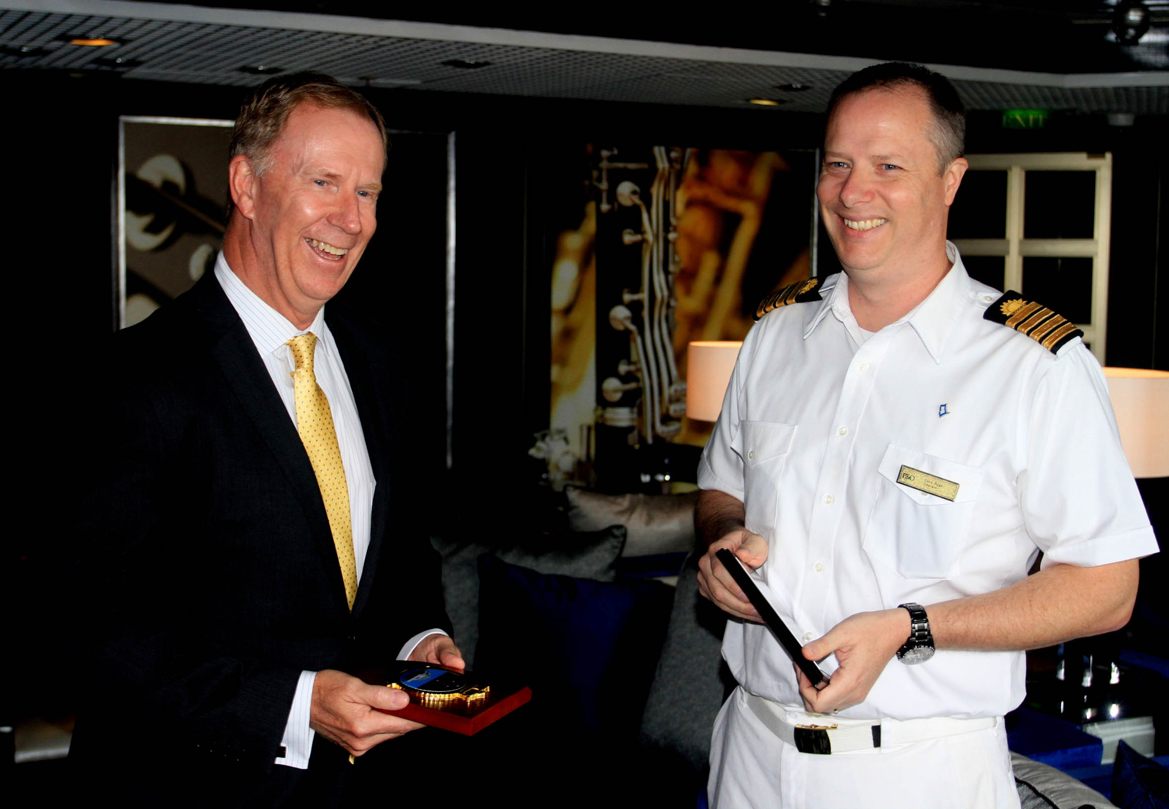 CEO Port of Newcastle Geoff Crowe and Pacific Aria Capt Colm Ryan plaque exchange in Newcastle